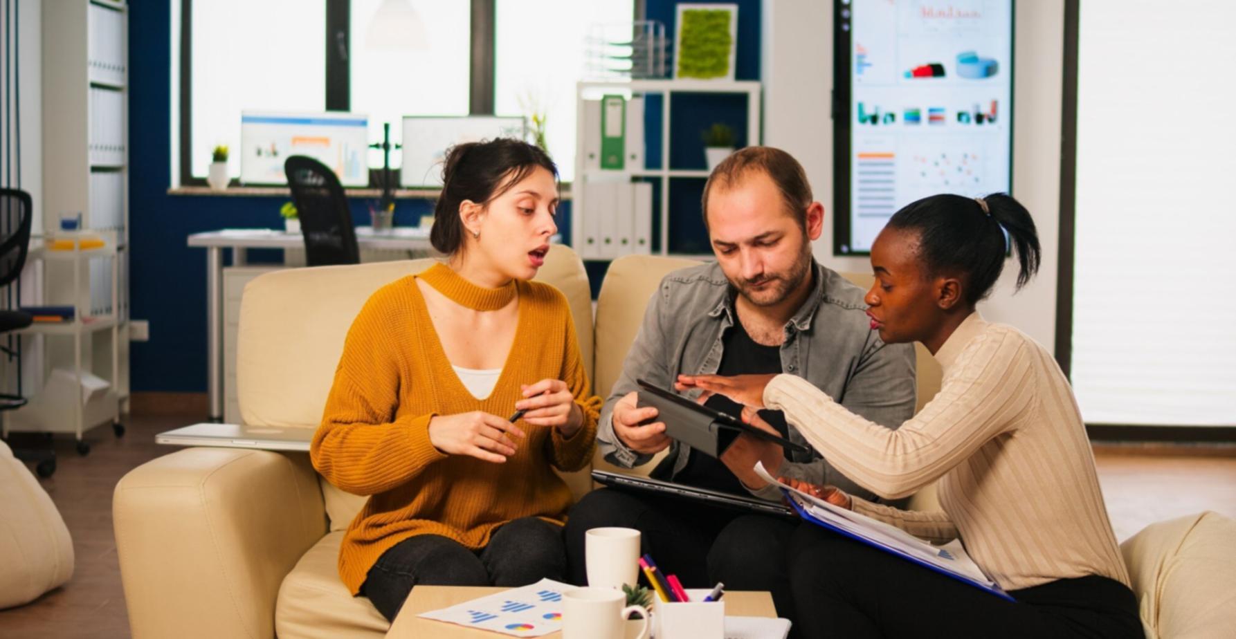 Franchise development meeting with financial documents and territory maps