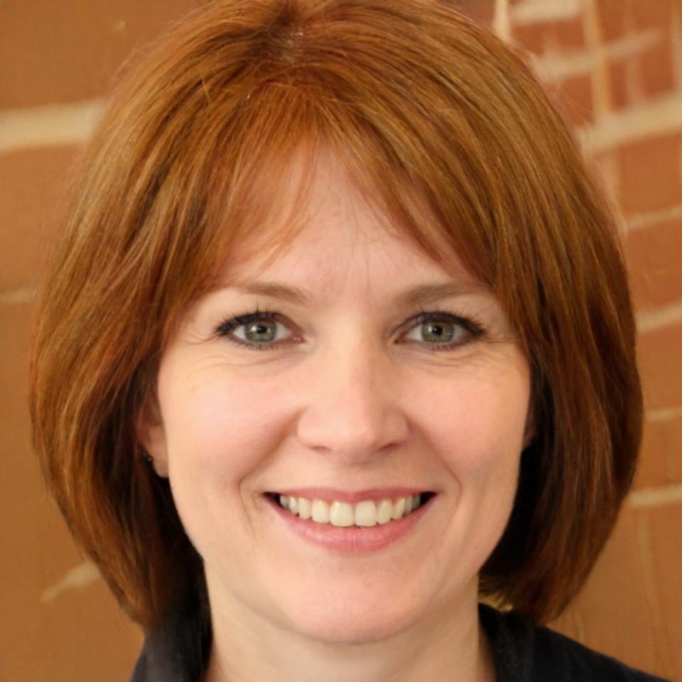 Professional headshot of Thea Kovač